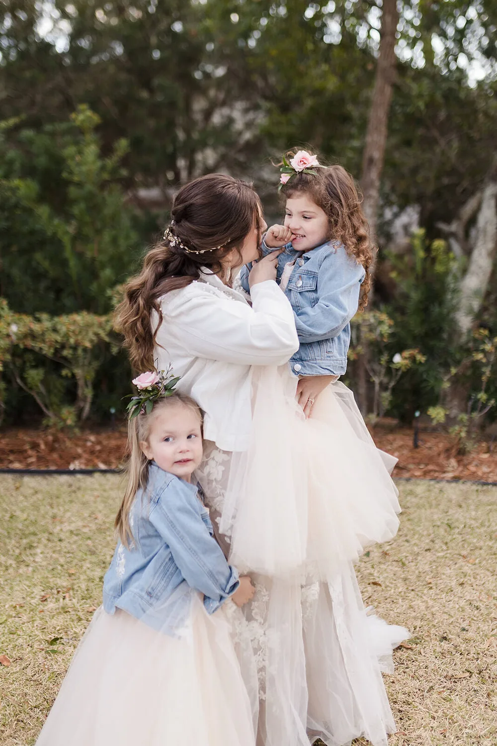 Bride walking with family before ceremony