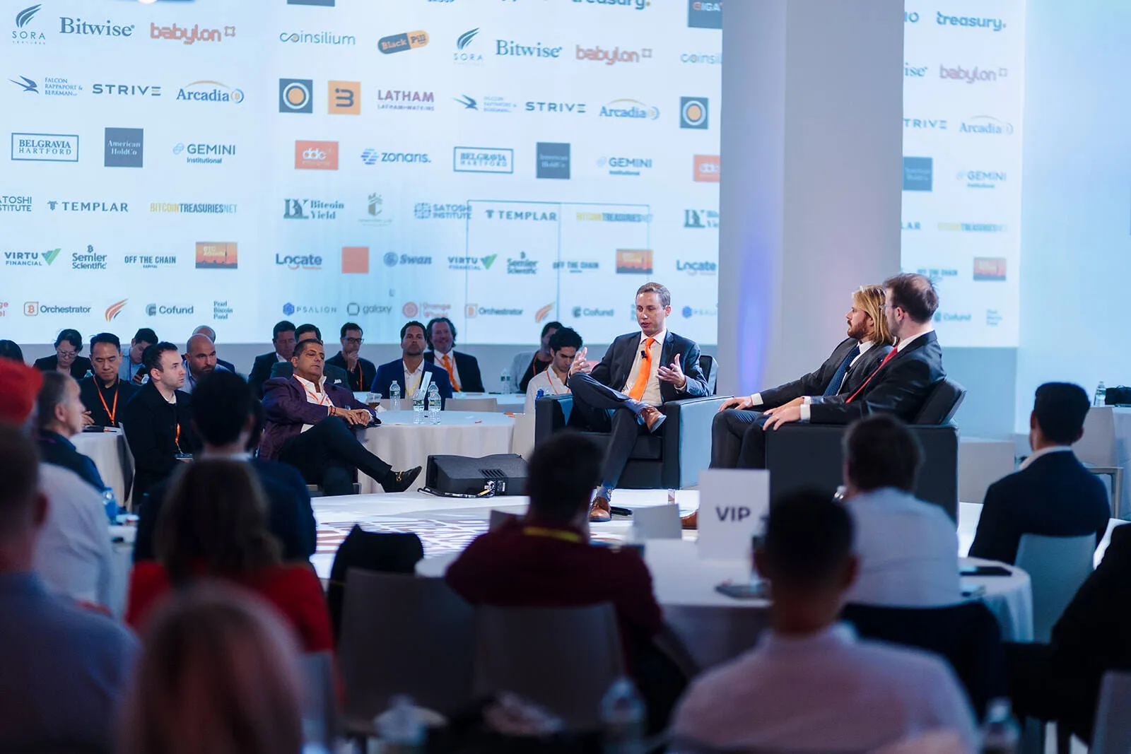Corporate conference panel and audience