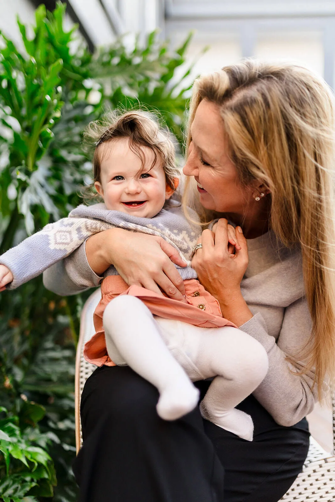 Mother holding a smiling child